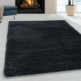 Antraciet hoogpolig fluffy shaggy vloerkleed voor openhaard