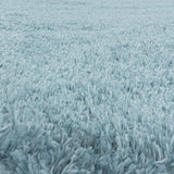 Detailfoto Blauwe hoogpolig fluffy shaggy vloerkleed