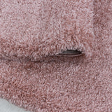 Zijaanzicht Roze hoogpolig fluffy shaggy vloerkleed