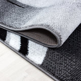 Modern-zwart-laagpolig-vloerkleed-voor-eetkamer