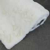 KNUFFEL fluffy vloerkleed ivoor wit - close-up zachte hoogpolige structuur