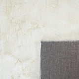 Onderkant KNUFFEL vloerkleed - geweven canvas backing detail ivoor wit