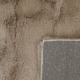Onderkant KNUFFEL vloerkleed - geweven canvas backing detail licht taupe