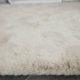 Zijkant detail KNUFFEL vloerkleed - 30 mm dikke pool en fluffy afwerking
