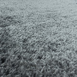 Detailfoto Grijze hoogpolig fluffy shaggy vloerkleed