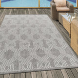 Onderhoudsvriendelijk outdoor vloerkleed Aruba, liggend op een zonnig terras.