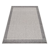 Onderhoudsvriendelijk outdoor vloerkleed Aruba, liggend op een zonnig balkon.