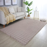 zacht beige tapijt met golvend patroon 3D effect in een woonkamer setting