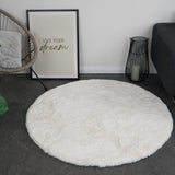 Rond fluffy vloerkleed ivoor wit - sfeerfoto in interieur