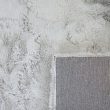 Onderkant KNUFFEL vloerkleed - geweven canvas backing detail lichtgrijs